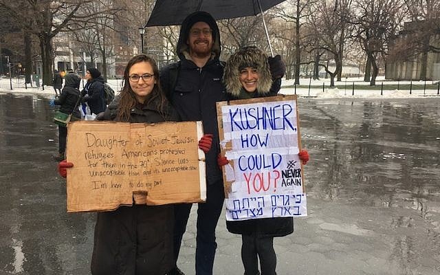 Elianna Kan, left, said the fact that her family members came to the US as refugees from the Soviet Union motivated her to attend the New York City rally with her friends Will Hunt and Sarah Rosen. (JTA/Josefin Dolsten)