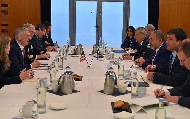 Defense Minister Avigdor Liberman and his team of security officials, right, sit down with their American counterparts led by US Secretary of Defense James Mattis, left, at the Munich Security Conference on February 17, 2017. (Ariel Hermoni/Defense Ministry)