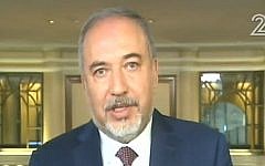 Defense Minister Avigdor Liberman talks to Israeli TV from a security conference in Munich, Germany on February 17, 2017 (screen capture: Channel 2)