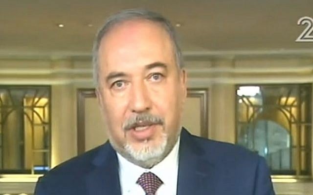 Defense Minister Avigdor Liberman talks to Israeli TV from a security conference in Munich, Germany on February 17, 2017 (screen capture: Channel 2)