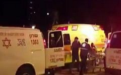 Rescue workers treat the victim of a shooting in Netanya on February 27, 2017 Screen capture/ YouTube)