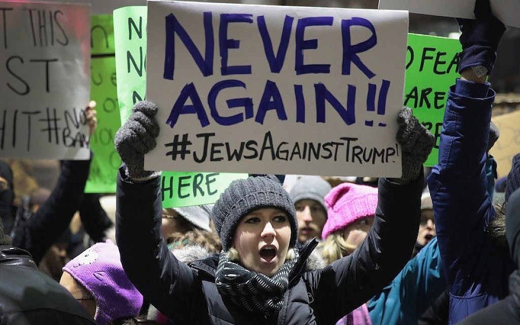 Demonstrators at Chicago’s O’Hare airport protesting Donald Trump’s executive order which imposes a freeze on admitting refugees from certain countries into the United States, Jan. 29, 2017. (Scott Olson/Getty Images via JTA)
