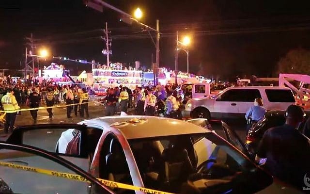 The scene in New Orleans shortly after a pickup truck rammed into a parade crowd, February 25, 2017. (YouTube screen capture) The scene in New Orleans shortly after a pickup truck rammed into a parade crowd, February 25, 2017. (YouTube screen capture)