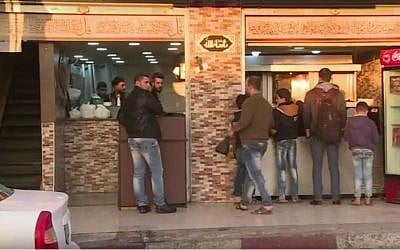 Anas Qaterji's restaurant in Nusseirat Palestinian refugee camp, south of Gaza City, 2017 (Screen capture: YouTube)