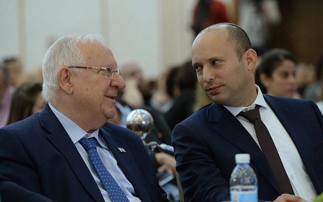 President of Israel, Reuven Rivlin (C) and Minister of Education Naftali Bennett , pictured at a conference for directors of local ducation departments in Jerusalem on February 28, 2017. Photo by Mark Neyman/GPO