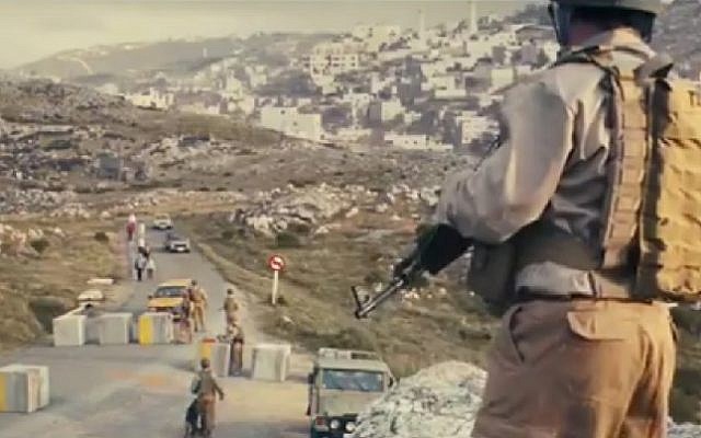 Screenshot from an Expedia ad shown during the Super Bowl on February 5, 2017 which appears to feature an Israeli roadblock in the West Bank. (Screenshot) Screenshot from an Expedia ad shown during the Super Bowl on February 5, 2017 which appears to feature an Israeli roadblock in the West Bank. (Screenshot)