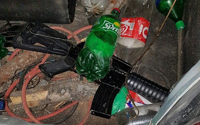 An illegal gun found in the trunk of a car that had approached the security fence surrounding the southern West Bank in the early morning of February 10, 2017. (IDF Spokesperson's Unit) An illegal gun found in the trunk of a car that had approached the security fence surrounding the southern West Bank in the early morning of February 10, 2017. (IDF Spokesperson's Unit)