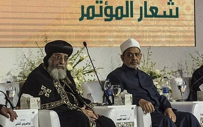 Egypt's Grand Imam of al-Azhar Sheikh Ahmed Mohamed al-Tayeb (R) and the leader of Egypt's Coptic Church, Pope Tawadros II of Alexandria attend a conference in Cairo, Egypt on February 28, 2017.(Khaled Desouki/AFP)