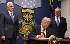 Illustrative: US President Donald Trump signing an executive order on January 27, 2017 at the Pentagon in Washington, DC. (AFP Photo/Mandel Ngan)