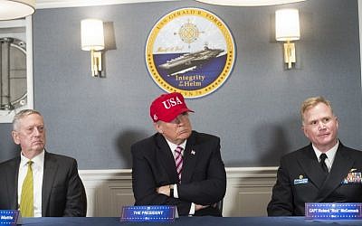 US President Donald Trump, center, Secretary of Defense James Mattis, left, and US Navy Captain Richard McCormack attend an operations briefing at the pre-commissioned USS Gerald R. Ford aircraft carrier in Newport News, Virginia, March 2, 2017. (AFP/Saul Loeb) US President Donald Trump, center, Secretary of Defense James Mattis, left, and US Navy Captain Richard McCormack attend an operations briefing at the pre-commissioned USS Gerald R. Ford aircraft carrier in Newport News, Virginia, March 2, 2017. (AFP/Saul Loeb)