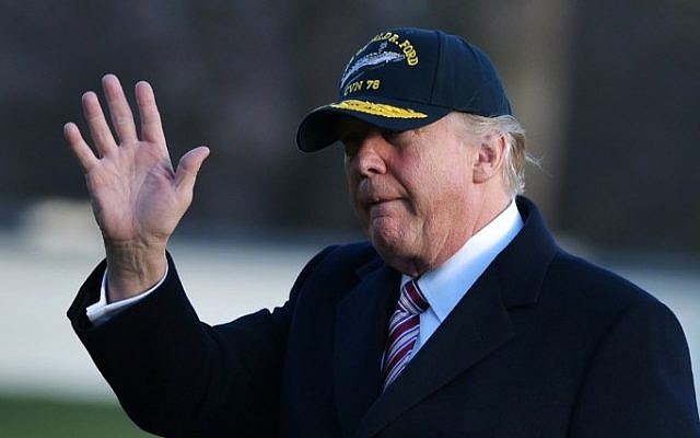 US President Donald Trump walks across the South Lawn upon return to the White House on March 2, 2017 in Washington, DC. (AFP PHOTO / MANDEL NGAN) US President Donald Trump walks across the South Lawn upon return to the White House on March 2, 2017 in Washington, DC. (AFP PHOTO / MANDEL NGAN)