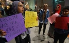 A group of Muslim protesters gather during a rally against the travel ban at San Diego International Airport on March 6, 2017 in San Diego, California.  
(AFP PHOTO / Sandy Huffaker)