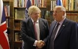 British Foreign Secretary Boris Johnson shakes hands with Israeli President Reuven Rivlin during their meeting in Jerusalem on March 8, 2017. (AFP PHOTO / POOL / RONEN ZVULUN)