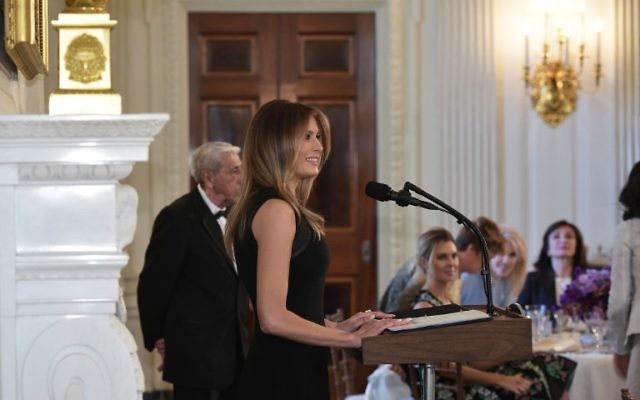US First Lady Melania Trump in the State Dining Room of the White House speaks at a luncheon on International Women's Day on March 8, 2017 in Washington, DC. (AFP PHOTO / MANDEL NGAN)