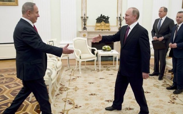 Prime Minister Benjamin Netanyahu shakes hands with Russian President Vladimir Putin (L) during their meeting in Moscow on March 9, 2017. (AFP Photo/Pool/Pavel Golovkin) Prime Minister Benjamin Netanyahu shakes hands with Russian President Vladimir Putin (L) during their meeting in Moscow on March 9, 2017. (AFP Photo/Pool/Pavel Golovkin)