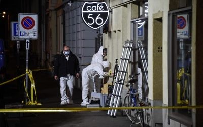 Police collect evidence at the site of a shooting on early March 10, 2017 in the city of Basel, north-west Switzerland. (AFP/Sebastien Bozon)