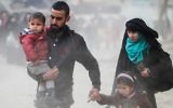 Displaced Iraqi families evacuate al-Amil neighborhood in west Mosul on March 10, 2017 as Iraqi forces advance in the city during the ongoing battle to seize it from the jihadists of the Islamic State (IS) group (AFP/Ahmad Al-Rubaye)