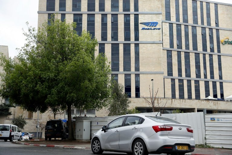 A car drives past the offices of Israeli car tech firm Mobileye in Jerusalem on March 13, 2017. Intel will buy Mobileye for more than $15 billion (14 billion euros), the companies said (AFP PHOTO / THOMAS COEX) A car drives past the offices of Israeli car tech firm Mobileye in Jerusalem on March 13, 2017. Intel will buy Mobileye for more than $15 billion (14 billion euros), the companies said (AFP PHOTO / THOMAS COEX)