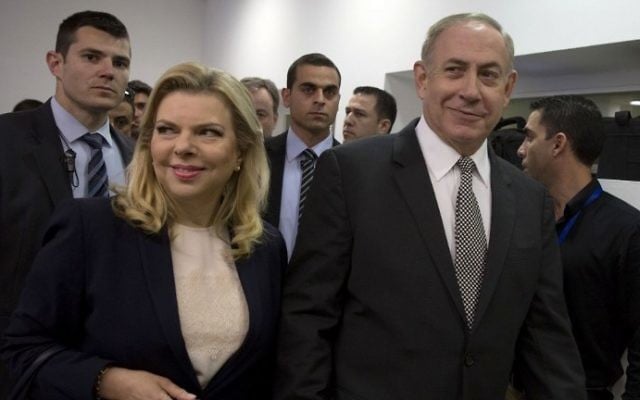 Prime Minister Benjamin Netanyahu (right) and his wife, Sara, as they enter the Tel Aviv Magistrate's Court on March 14, 2017. (AFP/Heidi Levine, Pool) Prime Minister Benjamin Netanyahu (right) and his wife, Sara, as they enter the Tel Aviv Magistrate's Court on March 14, 2017. (AFP/Heidi Levine, Pool)