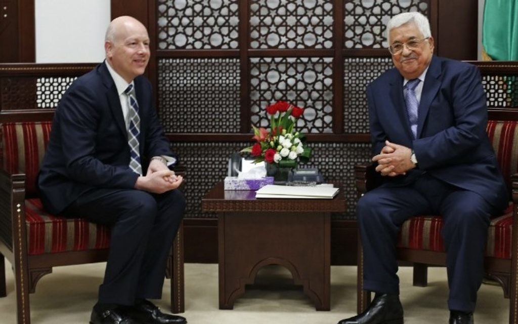 Palestinian Authority President Mahmoud Abbas (R) meets with Jason Greenblatt, Donald Trump's special representative for international negotiations, in the West Bank city of Ramallah, on March 14, 2017. (AFP Photo/Abbas Momani)