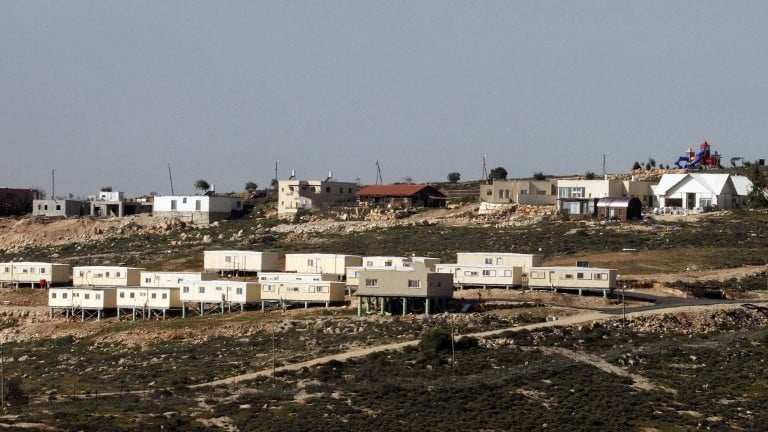 A picture taken from the Palestinian village of Sa'ir shows the Israeli settlement of Metzad on March 15, 2017. (AFP Photo/Hazem Bader) A picture taken from the Palestinian village of Sa'ir shows the Israeli settlement of Metzad on March 15, 2017. (AFP Photo/Hazem Bader)