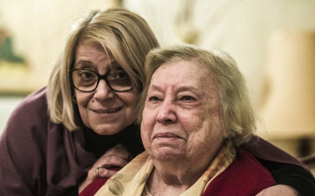 The president of the Egyptian Jewish Community Magda Shehata Haroun, left, and her mother Marcelle Haroun, right, pose for a picture during an interview at their home in Cairo on February 11, 2017. (Khaled Desouki/AFP)