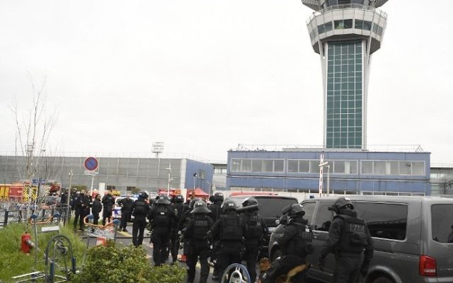 French police secure the area at Paris's Orly airport on March 18, 2017 following the shooting of a man by French security forces. (AFP/Christophe Simon) French police secure the area at Paris's Orly airport on March 18, 2017 following the shooting of a man by French security forces. (AFP/Christophe Simon)