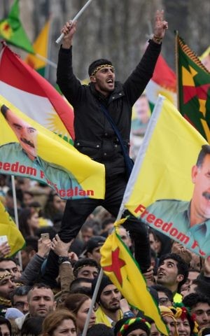 Kurdish protesters demonstrate with placards reading "No to dictatorship" and the portrait of the leader of the Kurdistan PKK Workers' Party, Abdullah Ocalan in the city center of Frankfurt am Main, western Germany, on March 18, 2017. (AFP Photo/dpa/Boris Roessler) Kurdish protesters demonstrate with placards reading "No to dictatorship" and the portrait of the leader of the Kurdistan PKK Workers' Party, Abdullah Ocalan in the city center of Frankfurt am Main, western Germany, on March 18, 2017. (AFP Photo/dpa/Boris Roessler)