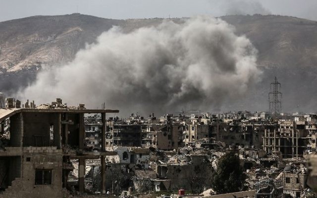 Smoke billows following a reported air strike in the rebel-held parts of the Jobar district, on the eastern outskirts of the Syrian capital Damascus, on March 19, 2017 .(AFP PHOTO / AMER ALMOHIBANY) Smoke billows following a reported air strike in the rebel-held parts of the Jobar district, on the eastern outskirts of the Syrian capital Damascus, on March 19, 2017 .(AFP PHOTO / AMER ALMOHIBANY)