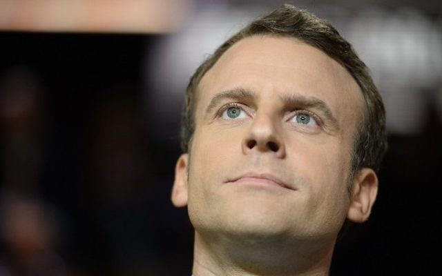 French presidential election candidate for the En Marche ! movement leader Emmanuel Macron looks on before a debate organised by the French private TV channel TF1 on March 20, 2017 in Aubervilliers, outside Paris. (AFP / POOL AND AFP PHOTO / Eliot BLONDET)