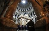 A picture taken on March 21, 2017 at the Church of the Holy Sepulchre in the Old City of Jerusalem shows the renovated Edicule of the Tomb of Jesus (Thomas Coex/AFP)