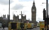 Members of the emergency services work to help victims on Westminster Bridge, alongside the Houses of Parliament in central London on March 22, 2017. (AFP Photo/Miklas Halle'n)