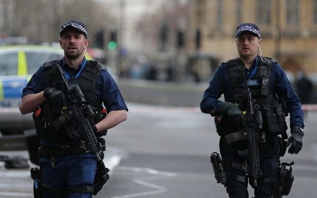 Armed British police officers patrol outside the Houses of Parliament in Westminster, central London on March 22, 2017 after a terror attack. (AFP Photo/Daniel Leal-Olivas) Armed British police officers patrol outside the Houses of Parliament in Westminster, central London on March 22, 2017 after a terror attack. (AFP Photo/Daniel Leal-Olivas)