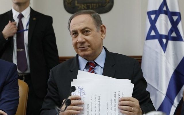 Prime Minister Benjamin Netanyahu chairs a cabinet meeting in Jerusalem, March 26, 2017. (AFP/Gali TIBBON)