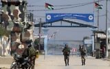Illustrative image of Hamas security forces standing guard at the Erez border crossing into Israel, in Beit Hanun, in the northern Gaza Strip on March 26, 2017. (AFP/Mahmud Hams)