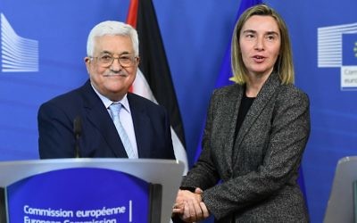 Palestinian Authority President Mahmoud Abbas (L) speaks with EU foreign policy chief Federica Mogherini during a press conference following their meeting at the European Commission in Brussels on March 27, 2017. ( EMMANUEL DUNAND / AFP)