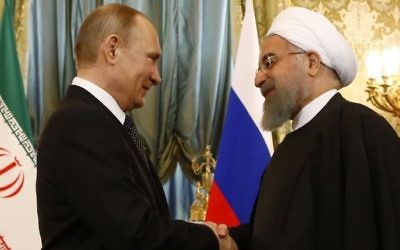 Russian President Vladimir Putin (L) shakes hands with his Iranian counterpart Hassan Rouhani during their meeting at the Kremlin in Moscow on March 28, 2017. (Sergei Karpukhin/AFP) Russian President Vladimir Putin (L) shakes hands with his Iranian counterpart Hassan Rouhani during their meeting at the Kremlin in Moscow on March 28, 2017. (Sergei Karpukhin/AFP)