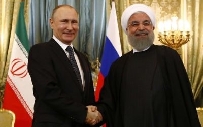 Russian President Vladimir Putin (L) shakes hands with his Iranian counterpart Hassan Rouhani during their meeting at the Kremlin in Moscow on March 28, 2017. (Sergei Karpukhin/AFP) Russian President Vladimir Putin (L) shakes hands with his Iranian counterpart Hassan Rouhani during their meeting at the Kremlin in Moscow on March 28, 2017. (Sergei Karpukhin/AFP)