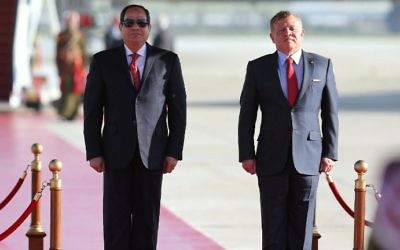 Jordan's King Abdullah II (R) and Egyptian President Abdel Fattah el-Sissi at Queen Alia International Airport in Amman on March 28, 2017. (AFP Photo/Khalil Mazraawi) Jordan's King Abdullah II (R) and Egyptian President Abdel Fattah el-Sissi at Queen Alia International Airport in Amman on March 28, 2017. (AFP Photo/Khalil Mazraawi)