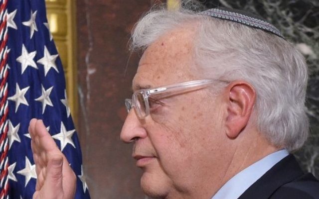 David Friedman is sworn in as the US ambassador to Israel during a ceremony in the Eisenhower Executive Office Building, next to the White House in Washington, DC, on March 29, 2017. (AFP/Mandel Ngan) David Friedman is sworn in as the US ambassador to Israel during a ceremony in the Eisenhower Executive Office Building, next to the White House in Washington, DC, on March 29, 2017. (AFP/Mandel Ngan)