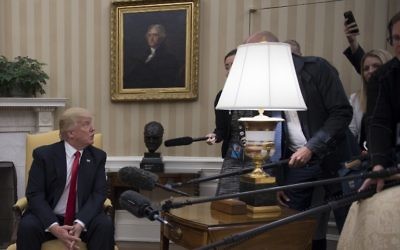 US President Donald Trump takes a question from the Danish press during a meeting with Danish Prime Minister Lars Lokke Rasmussen at the White House in Washington, DC, March 30, 2017. (Jim Watson/AFP)