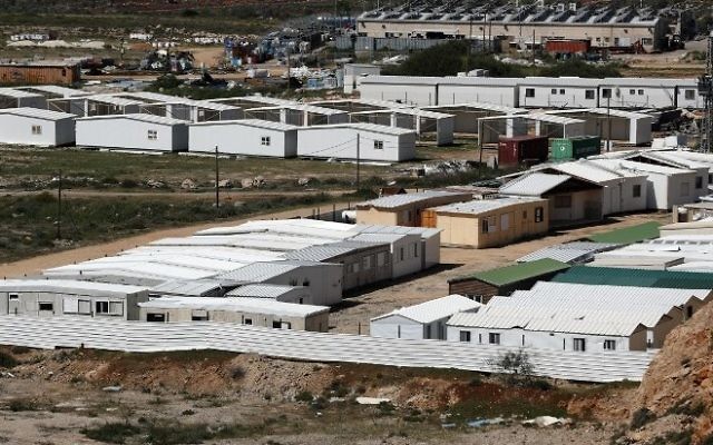 A partial view taken on March 31, 2017, shows dismantled caravans from the Amona outpost placed in the West Bank outpost of Shilo. (AFP/Thomas Coex)