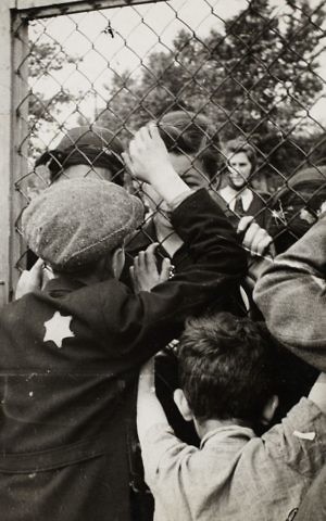 Children talking through the fence of the central prison on Czarneck Street prior to deportation. (Henryk Ross/Art Gallery of Ontario, gift from the Archive of Modern Conflict/Courtesy Museum of Fine Arts) Children talking through the fence of the central prison on Czarneck Street prior to deportation. (Henryk Ross/Art Gallery of Ontario, gift from the Archive of Modern Conflict/Courtesy Museum of Fine Arts)
