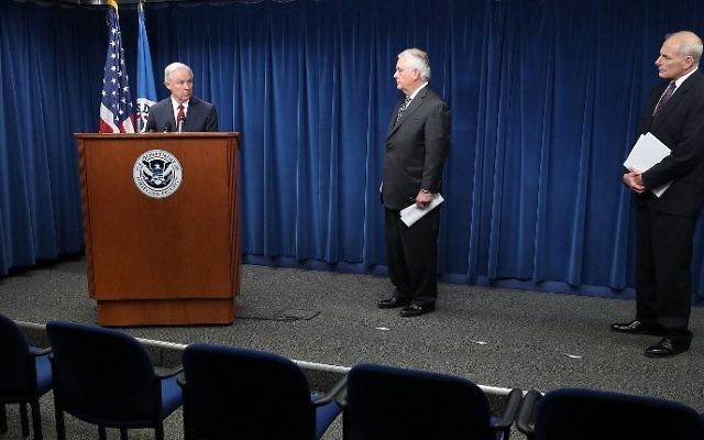 Attorney General Jeff Sessions , left, speaks as Secretary of Homeland Security John Kelly, right, and Secretary of State Rex Tillerson look on, during a news conference about issues related to a reconstituted travel ban at the US Customs and Borders Protection headquarters, on March 6, 2017 in Washington, DC. Mark Wilson/Getty Images/AFP) Attorney General Jeff Sessions , left, speaks as Secretary of Homeland Security John Kelly, right, and Secretary of State Rex Tillerson look on, during a news conference about issues related to a reconstituted travel ban at the US Customs and Borders Protection headquarters, on March 6, 2017 in Washington, DC. Mark Wilson/Getty Images/AFP)