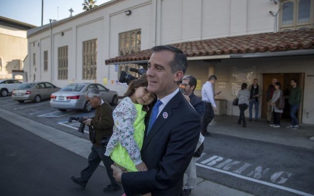 Los Angeles Mayor Eric Garcetti leaves his polling place with daughter Maya Garcetti, 5, after voting for mayor as Angelenos go to the polls on March 7, 2017 in Los Angeles, California. (David McNew/Getty Images/AFP) Los Angeles Mayor Eric Garcetti leaves his polling place with daughter Maya Garcetti, 5, after voting for mayor as Angelenos go to the polls on March 7, 2017 in Los Angeles, California. (David McNew/Getty Images/AFP)