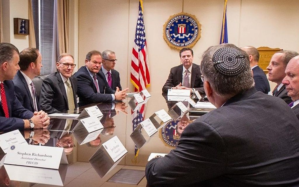 US Jewish leaders meet with the FBI director James Comey to discuss the ongoing investigation of bomb threats to JCCs on March 3, 2017. (Courtesy/Jewish Community Centers of North America ) US Jewish leaders meet with the FBI director James Comey to discuss the ongoing investigation of bomb threats to JCCs on March 3, 2017. (Courtesy/Jewish Community Centers of North America )