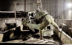 IDF soldiers seize equipment from a workshop suspected of being used to manufacture weapons illegally in the West Bank on March 29, 2017. (IDF Spokesperson's Unit)