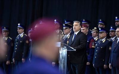 Hungarian Prime Minister Viktor Orban,delivers a speech during a swearing-in-ceremony for a new group of border guards known locally as “border hunters,” in Budapest, Hungary, Tuesday, March 7, 2017. (Szilard Koszticsak/MTI via AP)