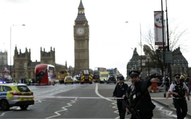 Police secure the area on the south side of Westminster Bridge close to the Houses of Parliament in London, Wednesday, March 22, 2017, during a terror attack in which 3 people were killed by an assailant, including a policeman. (AP Photo/Matt Dunham) Police secure the area on the south side of Westminster Bridge close to the Houses of Parliament in London, Wednesday, March 22, 2017, during a terror attack in which 3 people were killed by an assailant, including a policeman. (AP Photo/Matt Dunham)