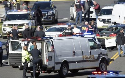 A woman, left, is taken into custody on Capitol Hill in Washington, Wednesday, March 29, 2017. (AP/Susan Walsh)